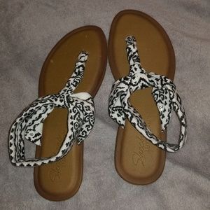 sandals with black and white fabric strap